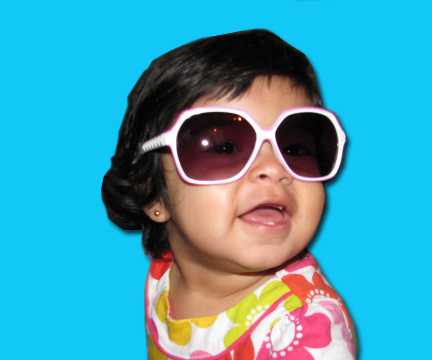 Children's white with pink big style sunglasses.