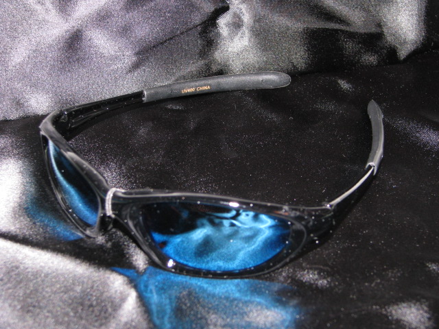 Sunglasses with black frames and blue mirror lenses.